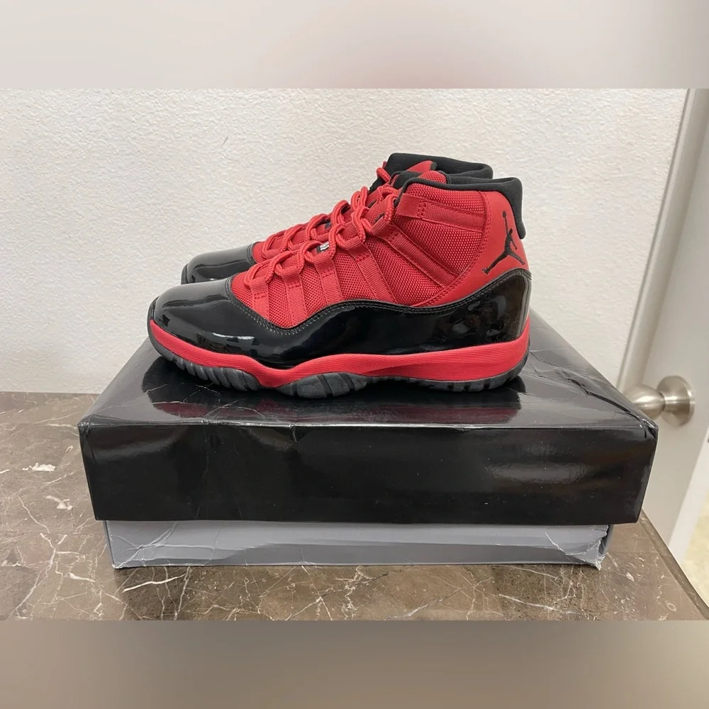 New! Unworn! Air Jordan 11 retro red and black men’s size 8
